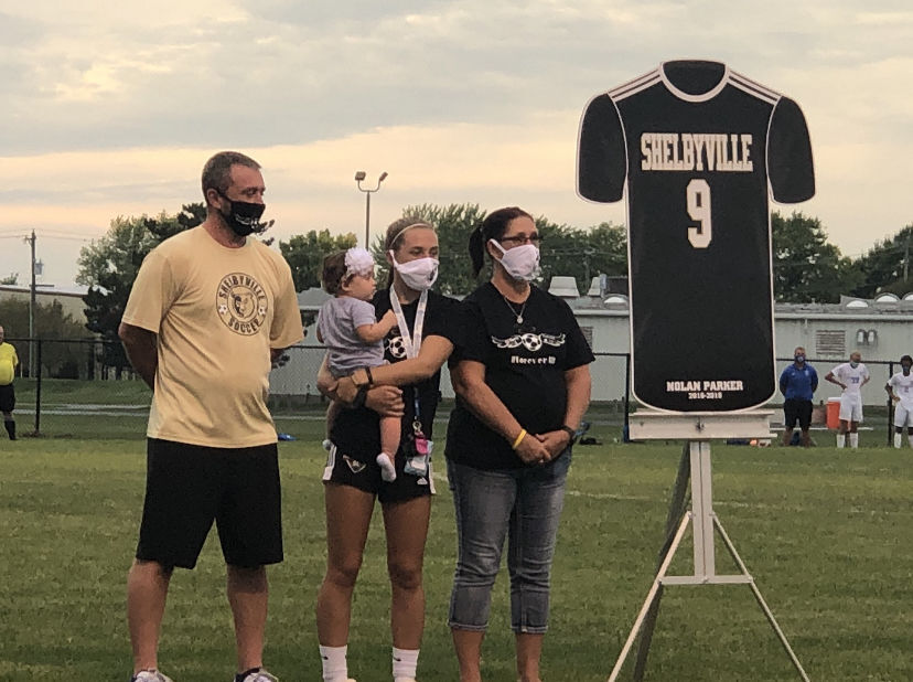 Parker honored with jersey number retirement